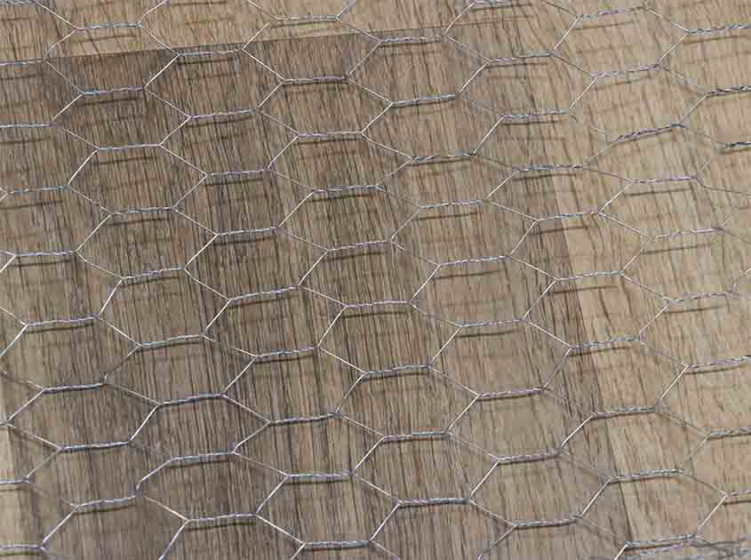 What are the installation considerations for chicken wire mesh on different surfaces
